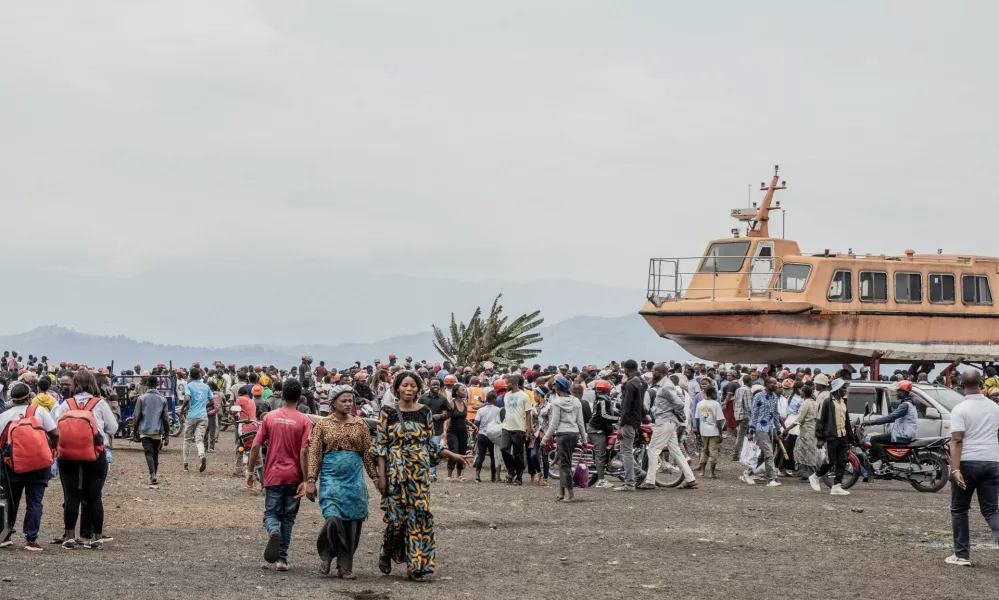 Residents gather to witness the search and rescue mission after a boat ferrying passengers and goods from the Minova villages sank in Lake Kivu near the Port of Kituku in Goma, North Kivu province of the Democratic Republic of Congo October 3, 2024. REUTERS/Stringer