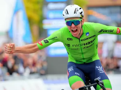 Cycling - UCI World Championships 2024 - Men's Elite Road Race - Zurich, Switzerland - September 29, 2024 Slovenia's Tadej Pogacar celebrates winning the race REUTERS/Denis Balibouse