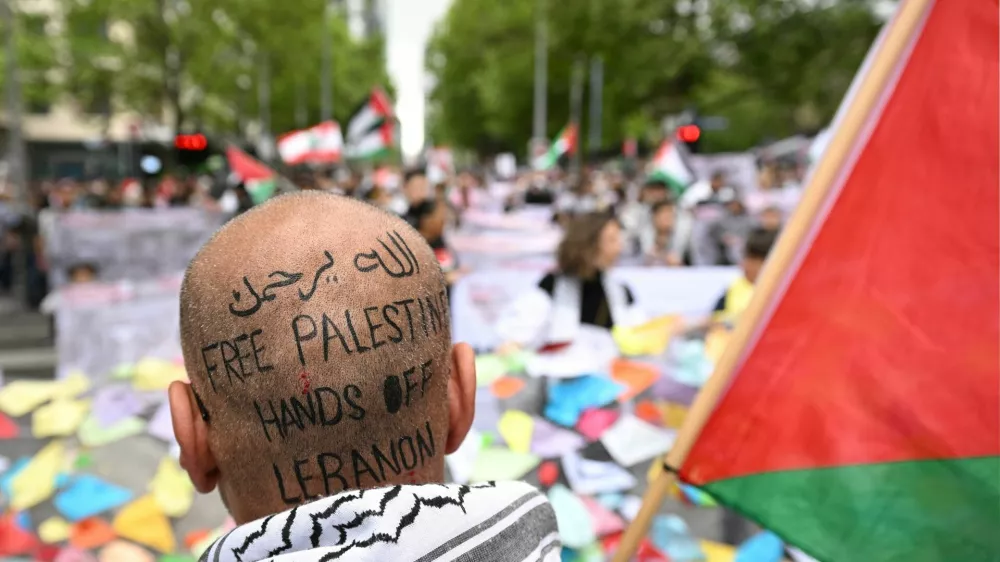 Protesters gather during a rally in support of Palestinians in Melbourne, Australia, October 6, 2024.  AAP/ James Ross via REUTERS  ATTENTION EDITORS - THIS IMAGE WAS PROVIDED BY A THIRD PARTY. NO RESALES. NO ARCHIVE. AUSTRALIA OUT. NEW ZEALAND OUT. NO COMMERCIAL OR EDITORIAL SALES IN NEW ZEALAND. NO COMMERCIAL OR EDITORIAL SALES IN AUSTRALIA.