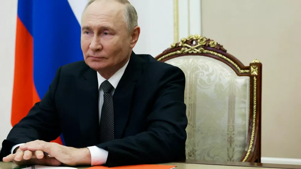 FILE PHOTO: Russian President Vladimir Putin chairs a meeting with members of the Security Council via video link in Moscow, Russia September 27, 2024. Sputnik/Sergei Ilyin/Kremlin via REUTERS ATTENTION EDITORS - THIS IMAGE WAS PROVIDED BY A THIRD PARTY./File Photo