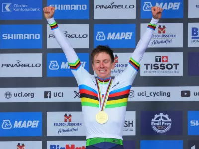 Cycling - UCI World Championships 2024 - Men's Elite Road Race - Zurich, Switzerland - September 29, 2024 Gold medallist Slovenia's Tadej Pogacar celebrates on the podium REUTERS/Denis Balibouse