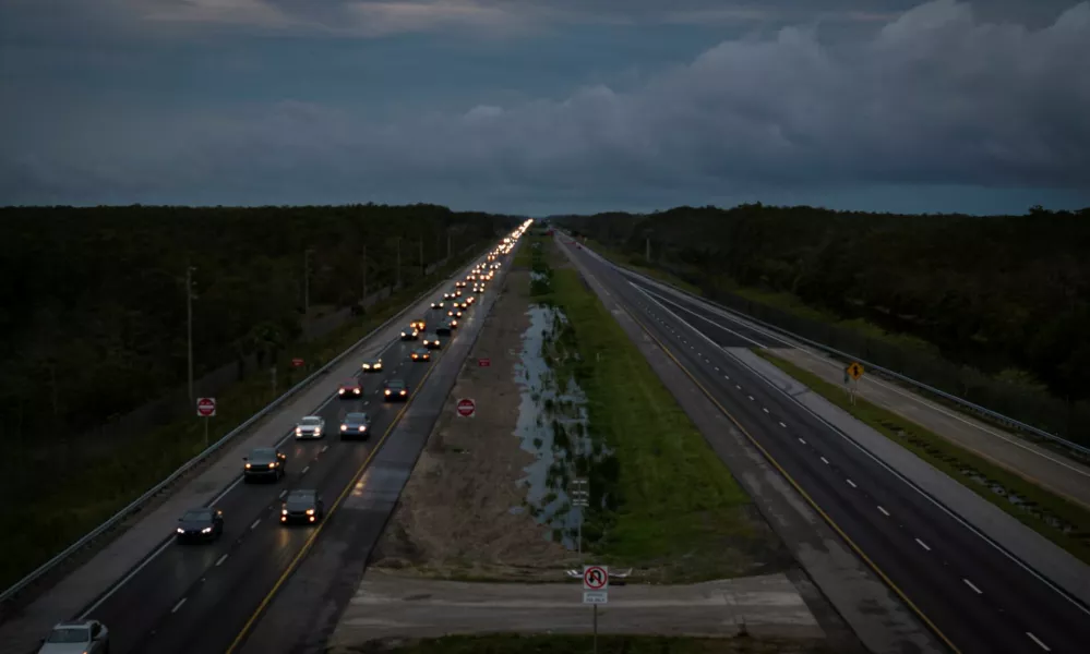 A drone view shows commuters driving east from the west coast ahead of the arrival of Hurricane Milton, at mile marker 51 on Interstate 75, Florida, U.S., October 8, 2024. REUTERS/Marco Bello