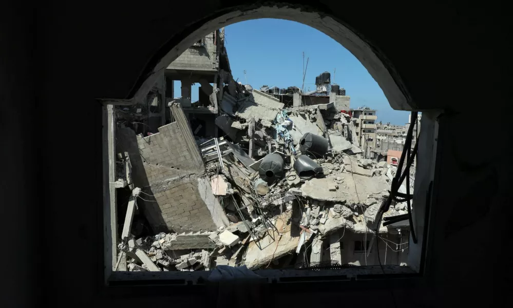 A house lies in ruins following an Israeli strike, amid the Israel-Hamas conflict, in Bureij refugee camp, in the central Gaza Strip, October 8, 2024. REUTERS/Ramadan Abed