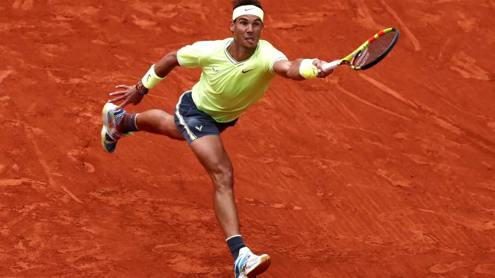 FILE PHOTO: Tennis - French Open - Roland Garros, Paris, France - June 9, 2019. Spain's Rafael Nadal in action during his final match against Austria's Dominic Thiem. REUTERS/Benoit Tessier/File Photo