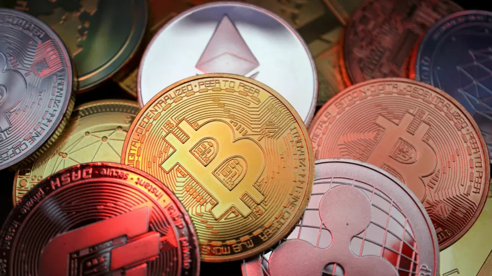 FILE PHOTO: Representations of cryptocurrencies including Bitcoin, Dash, Ethereum, Ripple and Litecoin are seen in this illustration picture taken June 2, 2021. REUTERS/Florence Lo/Illustration/File Photo