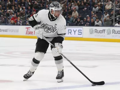 Dec 5, 2023; Columbus, Ohio, USA; Los Angeles Kings center Anze Kopitar (11) carries the puck as he enters the zone against the Columbus Blue Jackets during overtime at Nationwide Arena. Mandatory Credit: Russell LaBounty-USA TODAY Sports