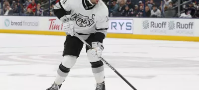 Dec 5, 2023; Columbus, Ohio, USA; Los Angeles Kings center Anze Kopitar (11) carries the puck as he enters the zone against the Columbus Blue Jackets during overtime at Nationwide Arena. Mandatory Credit: Russell LaBounty-USA TODAY Sports