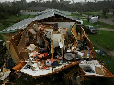 A property damaged after Hurricane Milton made landfall, in Lakewood Park, near Fort Pierce, in St. Lucie County, Florida, U.S., October 10, 2024. REUTERS/Jose Luis Gonzalez   TPX IMAGES OF THE DAY