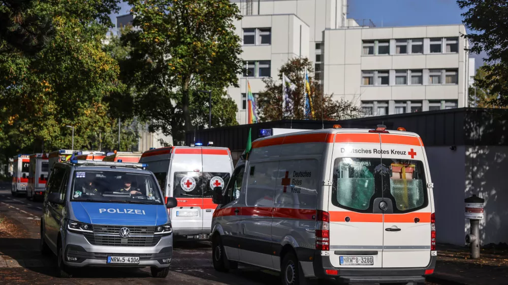 11 October 2024, North Rhine-Westphalia, Cologne: Ambulances wait outside the LVR clinic to transfer patients. A bomb from the Second World War is to be defused in Cologne on 11 October. Around 6,400 residents will have to leave their homes. According to the city, it is the most extensive evacuation of this kind in Cologne since 1945. Photo: Oliver Berg/dpa