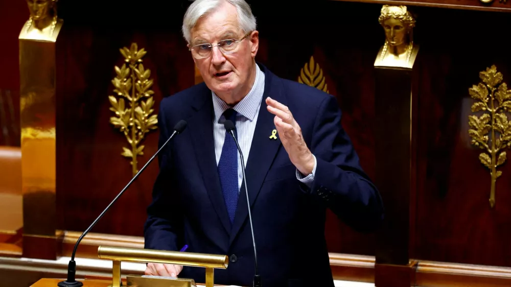 FILE PHOTO: French Prime Minister Michel Barnier delivers a speech during a censure motion debate filed by the alliance of left-wing parties the "Nouveau Front Populaire" (New Popular Front - NFP), after the questions to the government session at the National Assembly in Paris, France, October 8, 2024. REUTERS/Stephanie Lecocq/File Photo