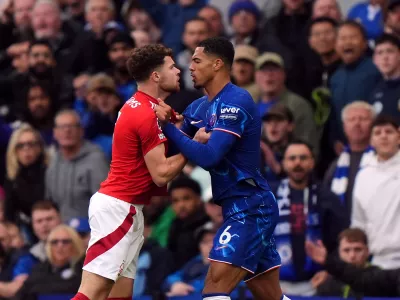 FILED - 06 October 2024, United Kingdom, London: Tempers flare between Nottingham Forest's Neco Williams and Chelsea's Levi Colwill during the English Premier League soccer match between Chelsea and Nottingham Forest at Stamford Bridge. Photo: Bradley Collyer/PA Wire/dpa