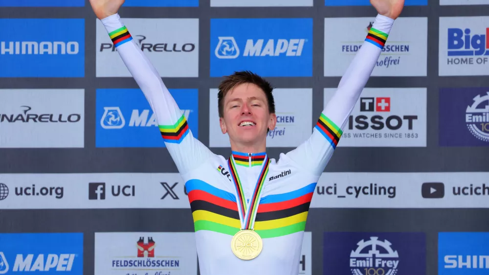 Cycling - UCI World Championships 2024 - Men's Elite Road Race - Zurich, Switzerland - September 29, 2024 Gold medallist Slovenia's Tadej Pogacar celebrates on the podium REUTERS/Denis Balibouse