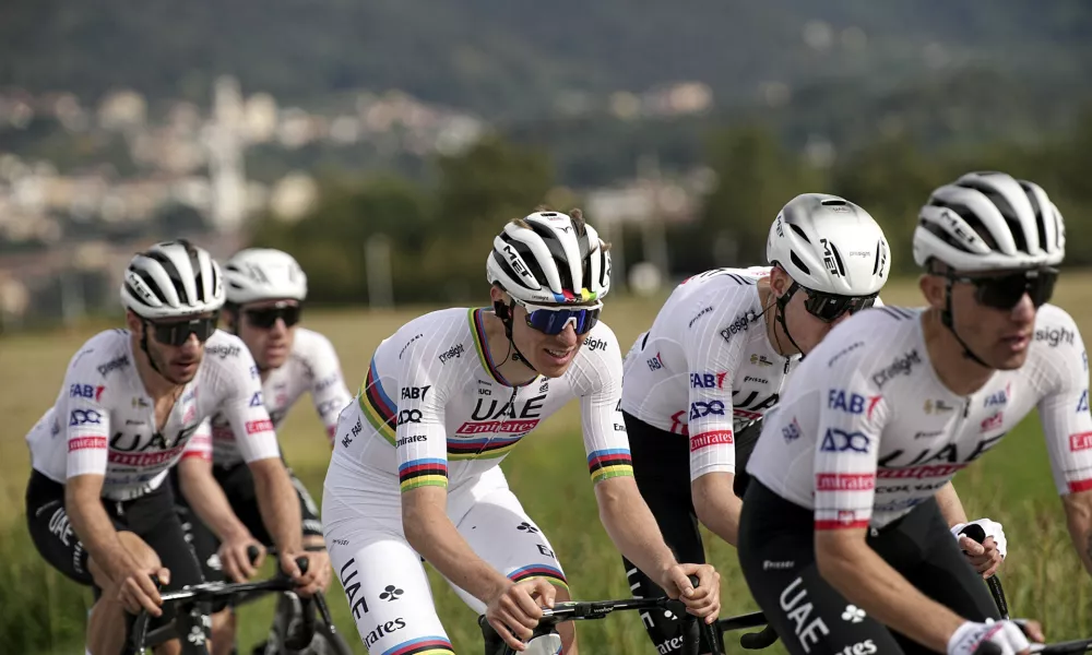 Reigning World Champion Slovenia's Tadej Pogacar, center, pedals during Il Lombardia, Tour of Lombardy cycling race, Italy, Saturday, Oct. 12, 2024. (Marco Alpozzi/LaPresse via AP)