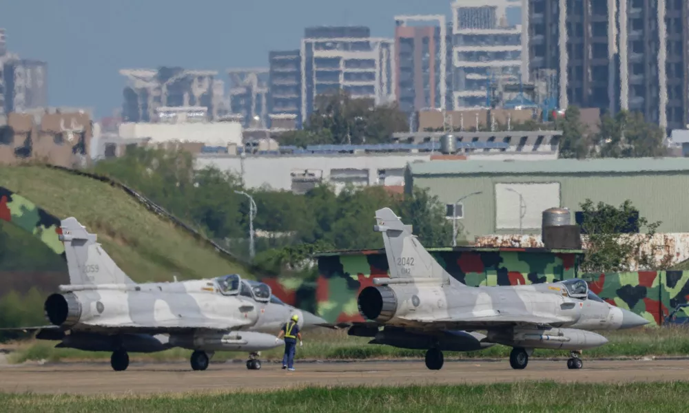 Taiwan Air Force Mirage 2000 aircraft prepare to takeoff at Hsinchu Air Base in Hsinchu, Taiwan October 14, 2024. REUTERS/Tyrone Siu