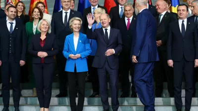 German Chancellor Olaf Scholz gestures during a family photo with European Commission President Ursula von der Leyen, Albania's Prime Minister Edi Rama, Hungarian Prime Minister Viktor Orban, Bulgaria's caretaker Prime Minister Dimitar Glavchev, Chairwoman of the Council of Ministers of Bosnia and Herzegovina Borjana Kristo, Kosovo's Prime Minister Albin Kurti, Croatian Prime Minister Andrej Plenkovic, Montenegro's Prime Minister Milojko Spajic, Slovenian President Natasa Pirc Musar, and other leaders from Western Balkan countries during the Berlin Process Summit, in Berlin, Germany, October 14, 2024. REUTERS/Lisi Niesner