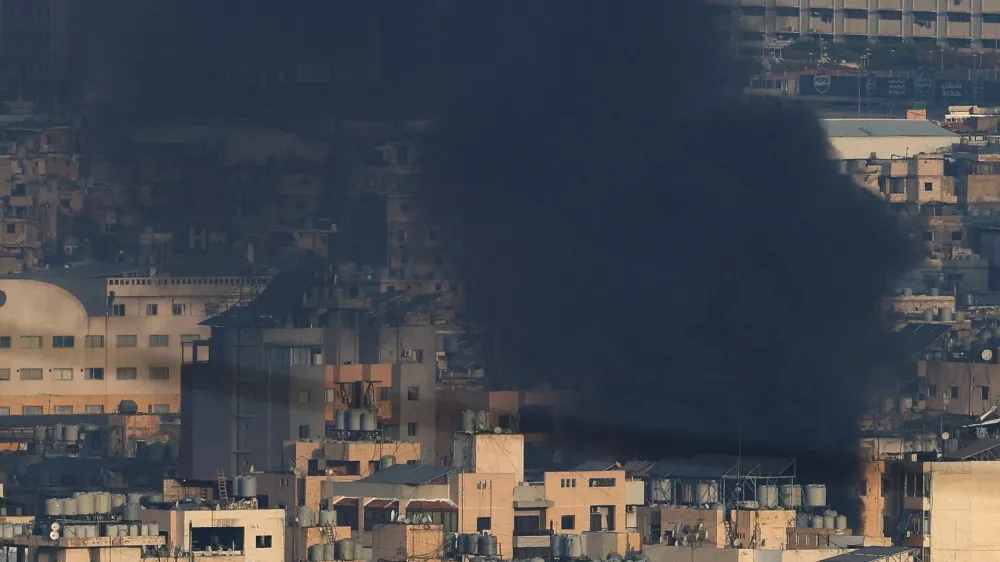 Smoke billows over Beirut's southern suburbs after an Israeli strike, amid the ongoing hostilities between Hezbollah and Israeli forces, as seen from Hadath, Lebanon October 16, 2024. REUTERS/Mohamed Azakir   TPX IMAGES OF THE DAY