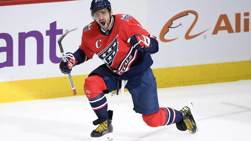 ﻿Washington Capitals left wing Alex Ovechkin celebrates his goal during the second period of the team's NHL hockey game against the New York Islanders, Tuesday, March 16, 2021, in Washington. This was Ovechkin's 718th career NHL goal, moving him to sixth on the career list. (AP Photo/Nick Wass)