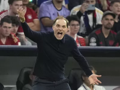 FILE - Bayern's head coach Thomas Tuchel shouts out as gives instructions from the side line during the Champions League semifinal first leg soccer match between Bayern Munich and Real Madrid at the Allianz Arena in Munich, Germany, Tuesday, April 30, 2024. (AP Photo/Matthias Schrader, File)