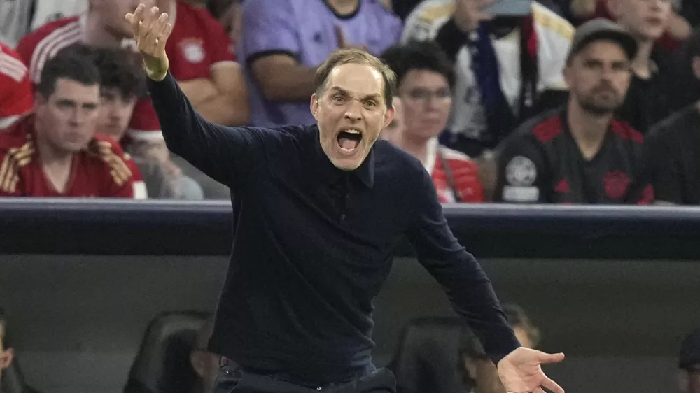 FILE - Bayern's head coach Thomas Tuchel shouts out as gives instructions from the side line during the Champions League semifinal first leg soccer match between Bayern Munich and Real Madrid at the Allianz Arena in Munich, Germany, Tuesday, April 30, 2024. (AP Photo/Matthias Schrader, File)