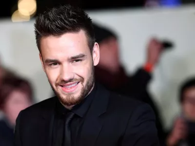 FILE PHOTO: Singer Liam Payne poses for photographers at the world premiere of the film "I am Bolt" in London, Britain, November 28, 2016. REUTERS/Neil Hall/File Photo