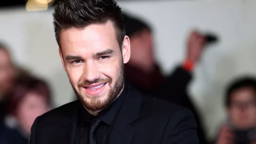 FILE PHOTO: Singer Liam Payne poses for photographers at the world premiere of the film "I am Bolt" in London, Britain, November 28, 2016. REUTERS/Neil Hall/File Photo