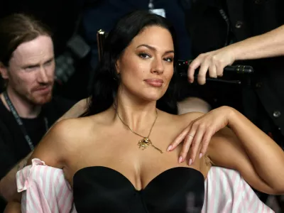 Model Ashley Graham is prepared backstage ahead of the 2024 Victoria's Secret Fashion Show in New York City, U.S., October 15, 2024. REUTERS/Andrew Kelly