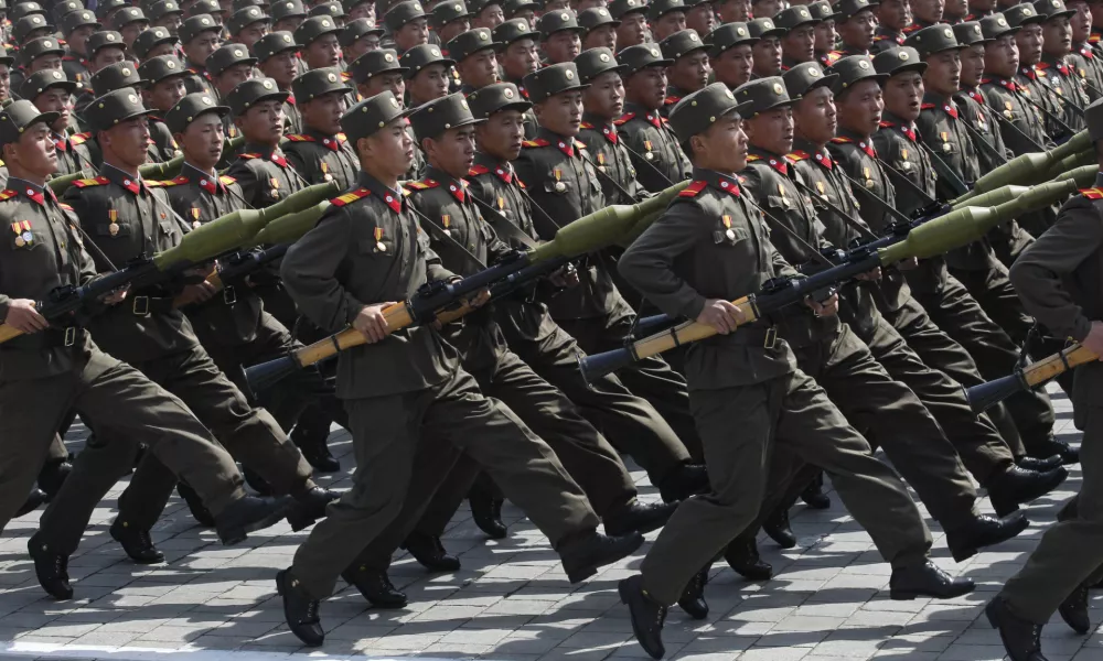 FILE - North Korean soldiers march during a mass military parade in Pyongyang's Kim Il Sung Square to celebrate 100 years since the birth of North Korean founder, Kim Il Sung on April 15, 2012. (AP Photo/Ng Han Guan, File)