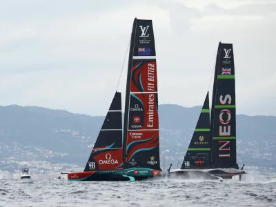 Sailing - 37th America's Cup - New Zealand v Britain - Barcelona, Spain - October 18, 2024 Emirates Team New Zealand and INEOS Britannia in action during race eight REUTERS/Albert Gea