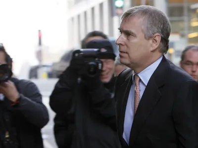 Britain's Prince Andrew arrives in Canary Wharf, London, to visit the headquarters of the London CrossRail project in London, Monday, March, 7, 2011. Prince Andrew will have to decide whether he can continue his role as a trade envoy amid a controversy about his links to a convicted pedophile, a British Cabinet minister said Monday. (AP Photo/Alastair Grant)