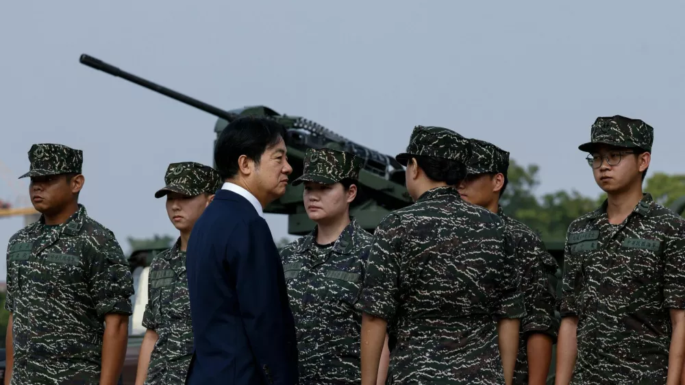 Taiwanese President Lai Ching-te visits a military base in response to recent Chinese military drills, in Taoyuan, Taiwan October 18, 2024. REUTERS/Tyrone Siu