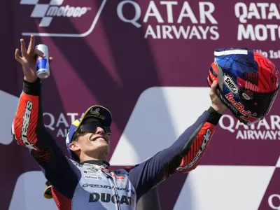 MotoGP - Australian Grand Prix - Phillip Island Grand Prix Circuit, Phillip Island, Australia - October 20, 2024 Gresini Racing MotoGP's Marc Marquez celebrates his victory on the podium REUTERS/Asanka Brendon Ratnayake