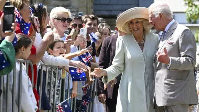 Britain's King Charles and Queen Camilla greet well wishers as they leave St Thomas' Anglican Church in Sydney, Sunday, Oct. 20, 2024. (Dean Lewins/Pool Photo via AP)