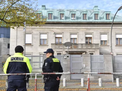 Police officers stand by the Israeli embassy in Berlin, Sunday, Oct. 20, 2024. (Paul Zinken/dpa via AP)