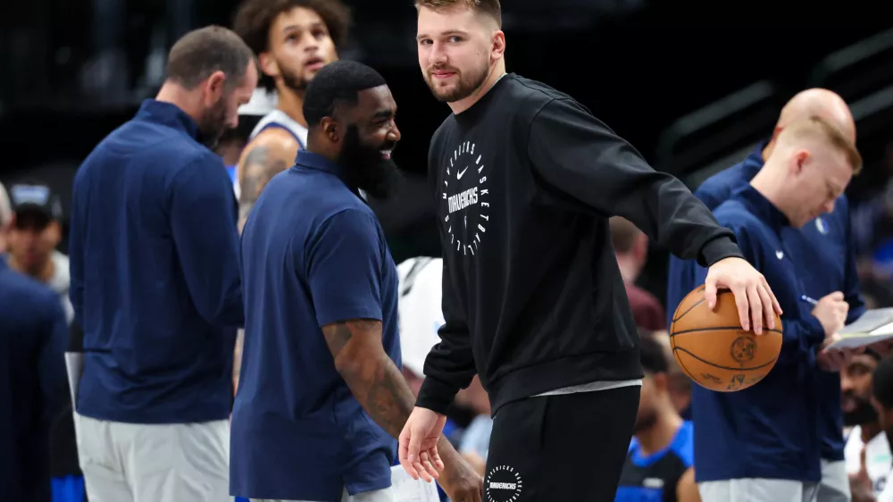 Oct 17, 2024; Dallas, Texas, USA; Dallas Mavericks guard Luka Doncic dribbles during a timeout during the first half against the Milwaukee Bucks at American Airlines Center. Mandatory Credit: Kevin Jairaj-Imagn Images