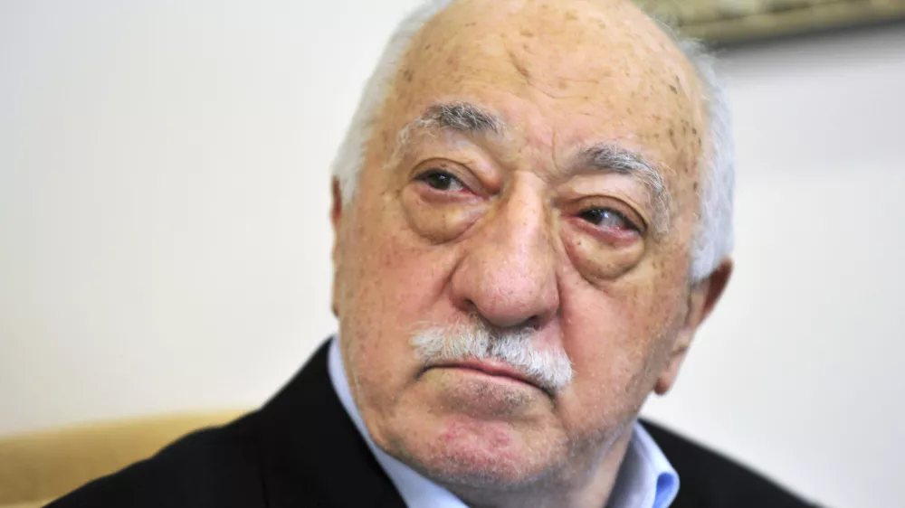 FILE - Turkish Islamic cleric Fethullah Gulen speaks to members of the media at his compound in Saylorsburg, Pa. in July 2016. (AP Photo/Chris Post, File)