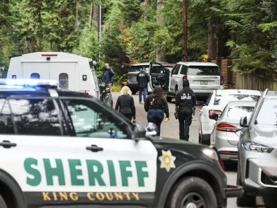 Police arrive on the scene of a shooting in Fall City, Washington, Monday, Oct. 21, 2024. (Kevin Clark/The Seattle Times via AP)