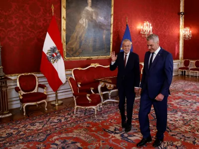 Austrian President Alexander Van der Bellen welcomes Chancellor and head of People's Party (OEVP) Karl Nehammer in Hofburg Palace in Vienna, Austria, October 21, 2024. REUTERS/Leonhard Foeger