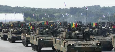 FILE - South Korean mechanized unit personnel parade with their armored vehicles during the media day for the 76th anniversary of Armed Forces Day at Seoul air base in Seongnam, South Korea, on Sept. 25, 2024. (AP Photo/Ahn Young-joon, File)