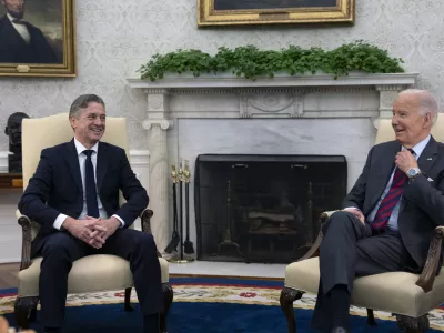 President Joe Biden meets with Slovenia's Prime Minister Robert Golob, left, in the Oval Office of the White House in Washington, Tuesday, Oct. 22, 2024. (AP Photo/Ben Curtis)