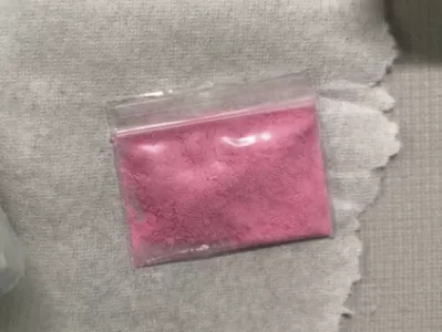 This photo provided by the Office of the Special Narcotics Prosecutor in New York shows a bag of pink cocaine in January 2023. (Office of the Special Narcotics Prosecutor in New York via AP)