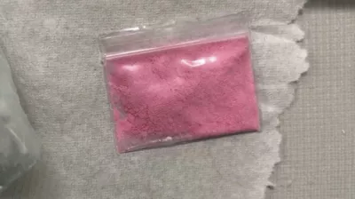 This photo provided by the Office of the Special Narcotics Prosecutor in New York shows a bag of pink cocaine in January 2023. (Office of the Special Narcotics Prosecutor in New York via AP)