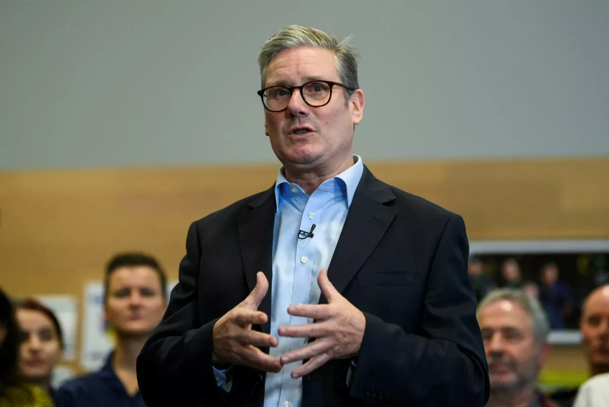 British Prime Minister Keir Starmer gestures during his visit to a NHS Healthcare Facility in East London, Britain, October 21, 2024. REUTERS/Jaimi Joy/Pool