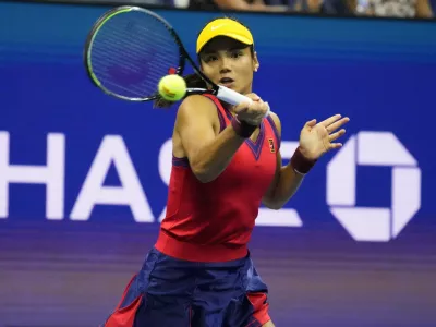 ﻿Sep 9, 2021; Flushing, NY, USA; Emma Raducanu of Great Britain hits a forehand against Maria Sakkari of Greece (not pictured)on day eleven of the 2021 U.S. Open tennis tournament at USTA Billie Jean King National Tennis Center. Mandatory Credit: Robert Deutsch-USA TODAY Sports