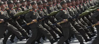 FILE - North Korean soldiers march during a mass military parade in Pyongyang's Kim Il Sung Square to celebrate 100 years since the birth of North Korean founder, Kim Il Sung on April 15, 2012. (AP Photo/Ng Han Guan, File)