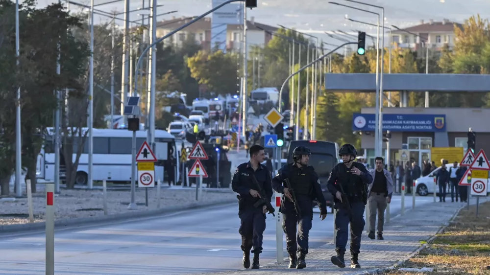 Emergency and security teams are deployed outside of Turkish Aerospace Industries Inc. at the outskirts of Ankara, Turkey, Wednesday, Oct. 23, 2024. (AP Photo/Mert Gokhan Koc)