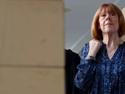 Gisele Pelicot, who has allegedly been drugged and raped by men solicited by her husband Dominique Pelicot at their home in the southern French town of Mazan, attends the trial of her husband with 50 co-accused, at the courthouse in Avignon, France, October 23, 2024. REUTERS/Manon Cruz