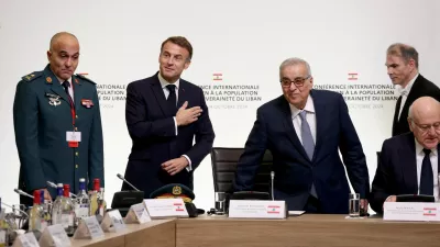 France's President Emmanuel Macron (C-L) gestures next to Lebanon's Foreign Affairs Minister Abdallah Bou Habib (C-R) and Lebanon's Prime Minister Najib Mikati (R) during an international press conference in support of Lebanon, in Paris on October 24, 2024. French President Emmanuel Macron opens a conference on Lebanon on October 24, 2024, in the hope of mobilising the international community to raise at least 0 million requested by the United Nations to help people displaced by the conflict between Israel and Hezbollah.   ALAIN JOCARD/Pool via REUTERS   TPX IMAGES OF THE DAY