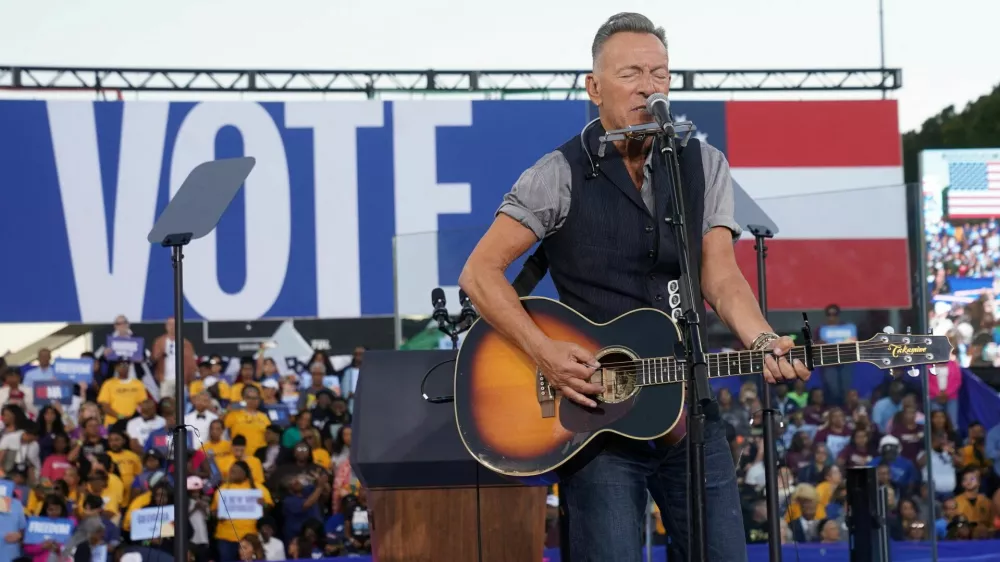 Bruce Springsteen performs during a rally for Democratic presidential nominee U.S. Vice President Kamala Harris in Atlanta, Georgia, U.S., October 24, 2024. REUTERS/Kevin Lamarque