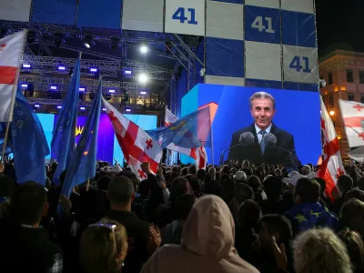 Founder of the Georgian Dream party Bidzina Ivanishvili is seen on a screen as he attends a final campaign rally held by the party's supporters ahead of the upcoming parliamentary elections in Tbilisi, Georgia October 23, 2024. REUTERS/Irakli Gedenidze