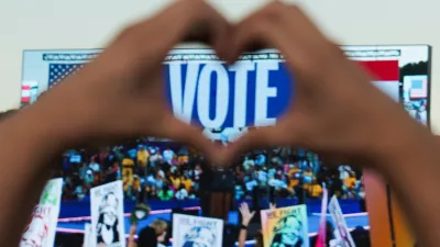 A supporter holds up their hands in heart shape as they attend Democratic presidential nominee U.S. Vice President Kamala Harris' campaign rally in Atlanta, Georgia, U.S., October 24, 2024. REUTERS/Megan Varner  TPX IMAGES OF THE DAY